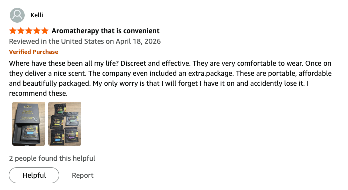 A customer review on Amazon for a product called 'Discovery Set', showing a five-star rating, a user name of Kelli, and a text review with two small product photos showing a black rectangular device with blue and gold details.