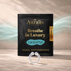 Eucalyptus clear silicone wearable nasal aromatherapy ring displayed in front of Auralis Discovery Set pouch on wooden surface