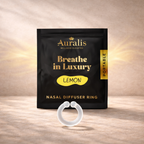 Lemon clear silicone wearable nasal aromatherapy ring displayed in front of Auralis Discovery Set pouch on wooden surface